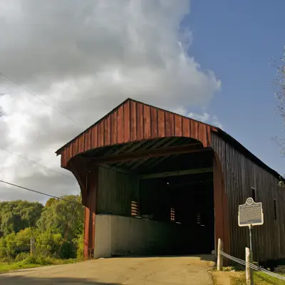 Red wooden covered bridge